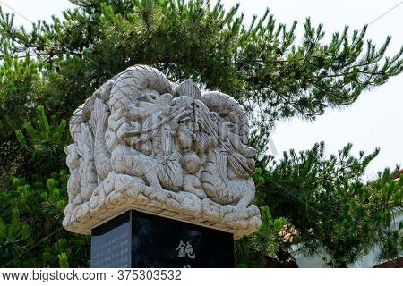 Gimhae, South Korea - June 18, 2017 : Figure Head Of The Ancient Chinese Stone Inscription Pillar Cr
