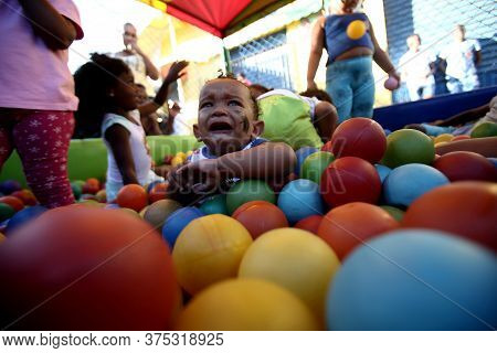 Salvador, Bahia / Brazil - October 15, 2017: Children Play In Pool During Children's Day Party Held 