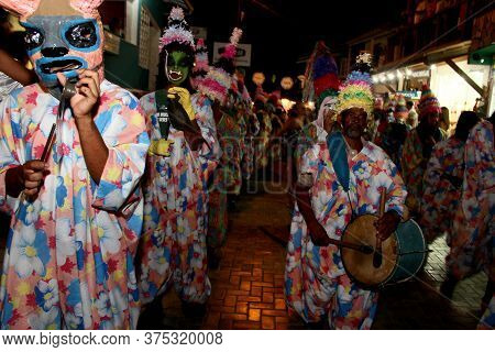 Cairu, Bahia / Brazil - November 14, 2013: Members Of The Caretas De Cairu Culture Group Are Seen Du