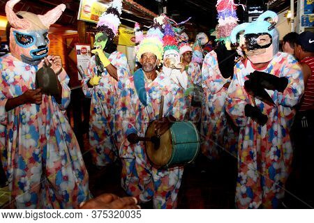 Cairu, Bahia / Brazil - November 14, 2013: Members Of The Caretas De Cairu Culture Group Are Seen Du