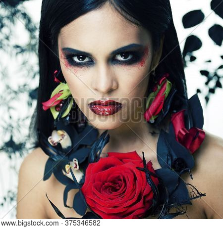 Pretty Brunette Woman With Rose Jewelry, Black And Red, Bright Make Up Kike A Vampire Closeup Red Li
