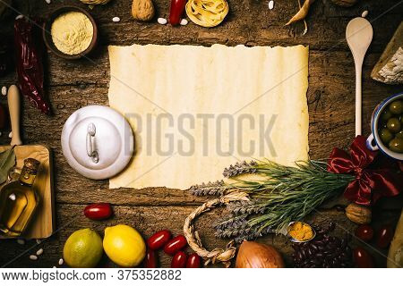 Extra Virgin Olive Oil, Green Olives And Food Ingredients,  Mediterranean Diet On Old Wooden Table.