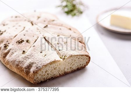 Homemade Fresh Baked Fougasse (french Bread) With Thyme And Olive Oil On White Background. Tradition