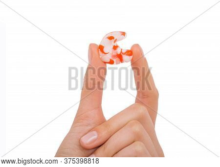 Isolated On White Earplug In Female Hand. Personally Molded Earplugs Close-up. Part Of The Set