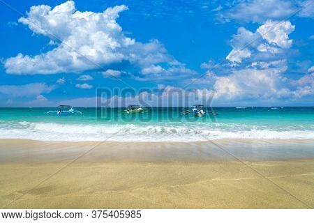 Sunny day at Kuta beach in Bali Indonesia