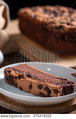 Chocolate Flavor Taiwanese Traditional Sponge Cake (taiwanese Castella Kasutera) On A Wooden Tray Ba