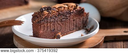 Chocolate Flavor Taiwanese Traditional Sponge Cake (taiwanese Castella Kasutera) On A Wooden Tray Ba