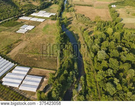 Aerial View Of Strumeshnitsa River Passing Through The Petrich Valley, Bulgaria