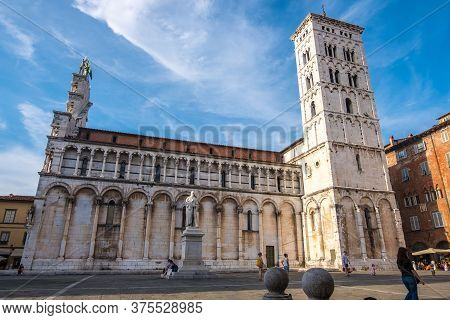 Lucca, Italy - August 17, 2019: Church Of San Michele In Foro And The Statue Of Francesco Burlamacch