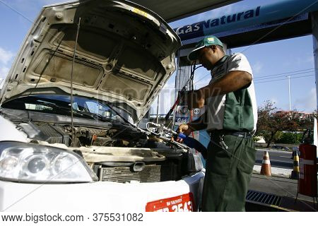 Salvador, Bahia / Brazil - December 6, 2016: Vehicle Is Seen During Filling With Vehicular Natural G