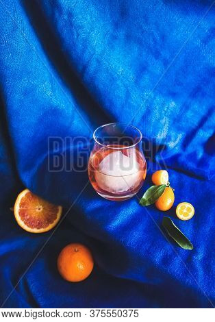 Home Made Cocktails Ingredients And Old Fashioned Drinl On Blue Fabric Drapery. For Social Media Net