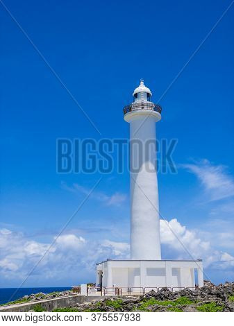 Summer Refreshing Blue Sky And Cape Zanpa Cape Lighthouse And Sea, A Tourist Spot In Okinawa