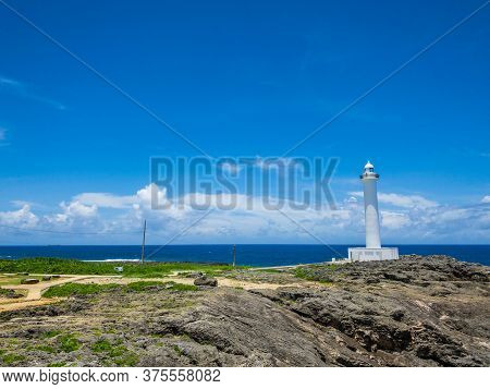 Summer Refreshing Blue Sky And Okinawa's Tourist Attractions, Cape Zanpa Lighthouse, Sea And Cliff