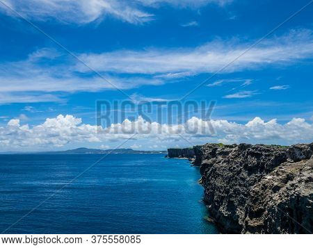 The Refreshing Summer Blue Sky And The Sea And Cliffs Of Cape Zanpa, A Sightseeing Spot In Okinawa