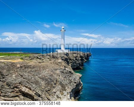 Summer Refreshing Blue Sky And Okinawa's Tourist Attractions, Cape Zanpa Lighthouse, Sea And Cliff