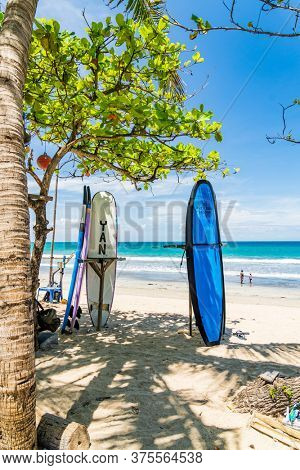KUTA BALI - INDONESIA, FEBRUARY 7 : Surfboards on the famous beach of Kuta in Bali Indonesia February 7th, 2020