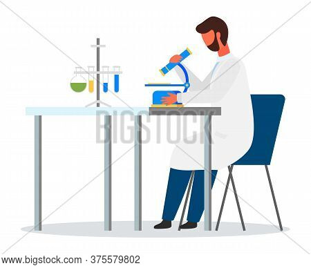 Scientist With Mircoscope Sitting At Table. Engineer Man Wearing White Gown Exploring Elements. Labo