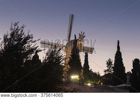 Jerusalem, Israel, June 26, 2020 : The Famous Montefiore Windmill Built In 1857, Now With Neighborho