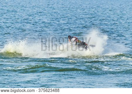 Man On Water Scooter. Summer Vacation On Personal Watercraft In Tropical Sea. Young Guy Sea Riding H