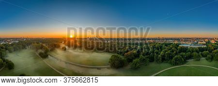 Wonderful Sunrise Over The Englischer Garten Of Munich, A Green Park In Summer.