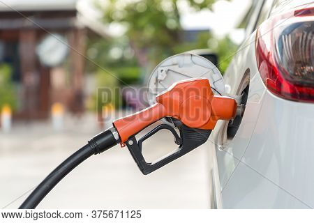 Refill And Filling Oil Gas Fuel At Station.gas Station - Refueling.to Fill The Machine With Fuel. Ca