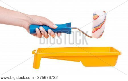 Hand With Striped Wool Paint Roller, Home Decoation And Improvement. Isolated On White Background.