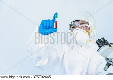 Doctors Wear A Face Shield / Ppe For Protection Against Coronavirus Disease. The Doctor Works Tirele