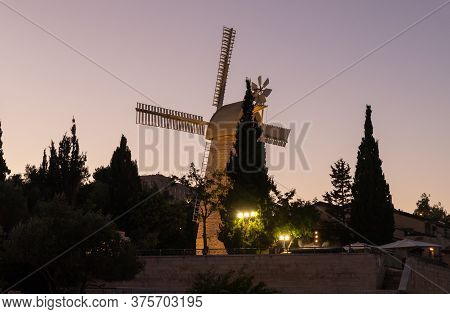 Jerusalem, Israel, June 26, 2020 : The Famous Montefiore Windmill Built In 1857, Now With Neighborho