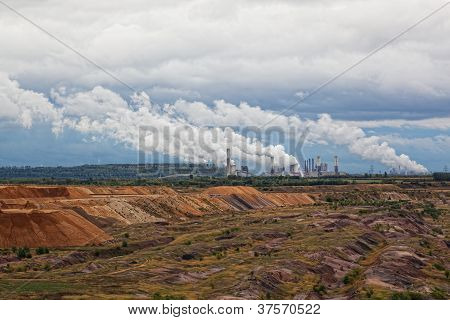 Thermal power plant against an open coal pit