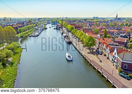 Aerial from the city Medemblik in the Netherlands at sunrise