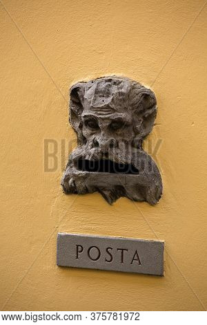 Vintage Mailbox Gap On Old Building Wall. Slot With Inscription Posta Or Mail On Metal Plate And Biz