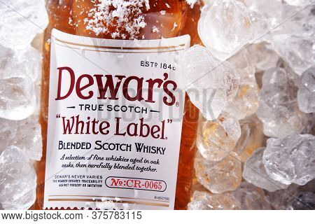 Bottle Of Dewars Blended Scotch Whisky In Crushed Ice