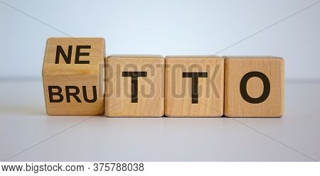 Wooden Cubes And Changes The Word 'netto' To 'brutto'. Beautiful White Background. Business Concept,