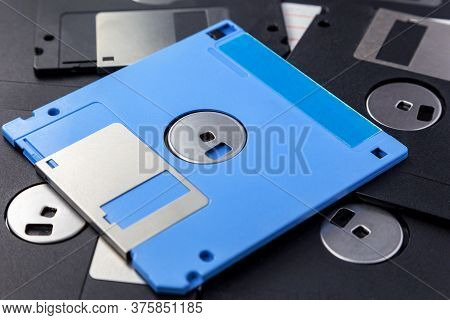Blue And Black 3.5 Inch Floppy Disks As Background.