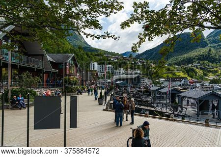 Editorial 09.07.2019 Geiranger Norway Tourists Walking Around The Streets Of Geiranger, A Town In Th