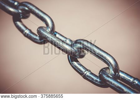 Stainless Steel Chain Links. Industrial Metal Background