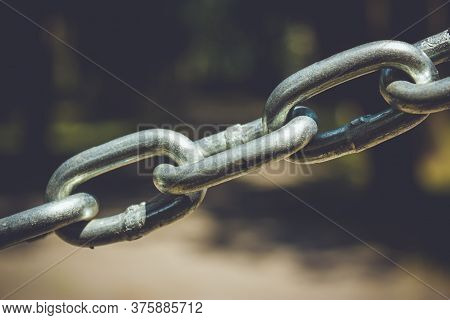 Stainless Steel Chain Links. Industrial Metal Background