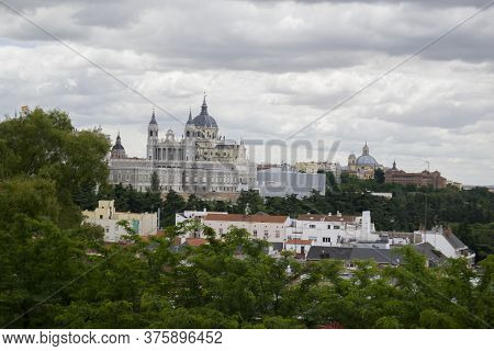 In The Frame We Can Appreciate The Almudena Cathedral, In Madrid. Also Part Of The City With A Compo