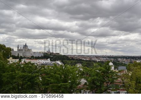 In The Frame We Can Appreciate The Almudena Cathedral, In Madrid. Also Part Of The City With A Compo