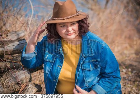 Mature Plus Size Woman, American Or European Appearance Walks And The  Enjoying Life. Lady With Exce