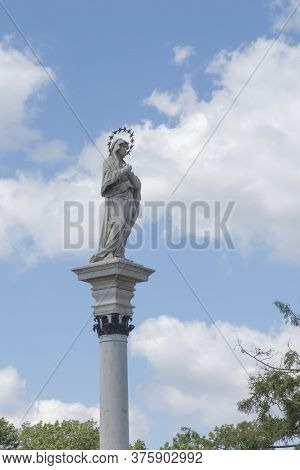 Statue Of Our Lady Of The Immaculate Conception In The Middle Of Square In Front Of The Monastery Ja