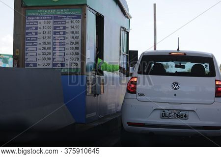 Camacari, Bahia / Brazil - October 17, 2019: Vehicle Is Seen In Toll Booth On The Ba 099 Highway In 