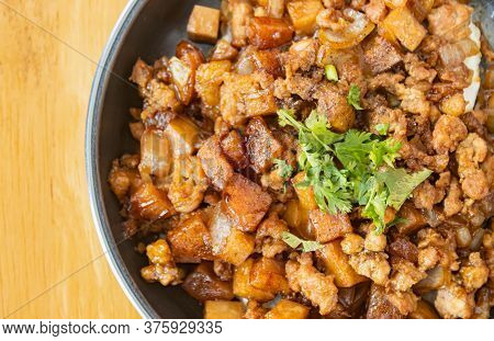 Stir Fried Pork With Onion And Garlic And Black Soy Sauce And Coriander Topping And Tofu With Natura