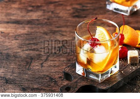 Old Fashioned - Classic Alcoholic Cocktail With Bourbon Whiskey, Bitter, Cane Sugar And Ice In Retro