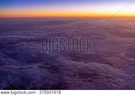 Aerial View Of High Altitude Clouds During Sunset
