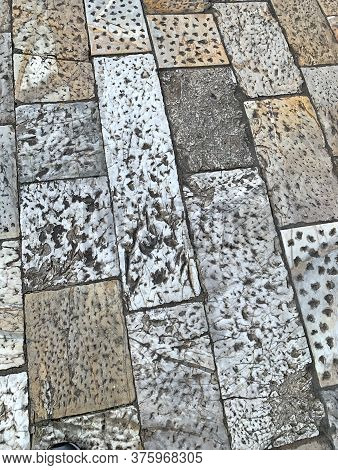 Stone Pavement With An Unusual Shape And Color, With Interesting Recesses. What Gives It An Exclusiv