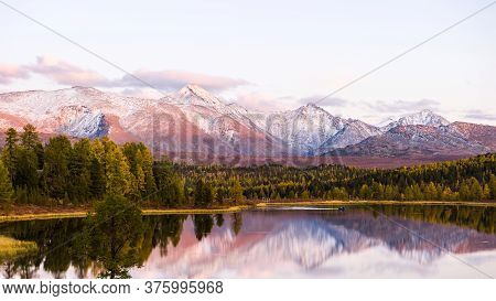 Lake Cicely Altai, Siberia, Pink Sunset Over A Lake And Mountains In Autumn Day. Taiga, Beautiful Sk