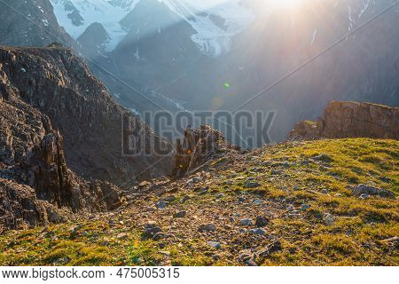 Sunny Mountain View From Cliff At Very High Altitude. Scenic Alpine Landscape With Beautiful Sharp R