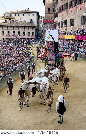 Siena, Italy - August 17 2022: Ox Cart Or Carroccio With Drappellone Banner At The Corteo Storico Hi