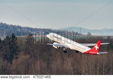 Zurich, Switzerland, January 2, 2023 Helvetic Airways Embraer E195-e2 Aircraft Leaving From Runway 2